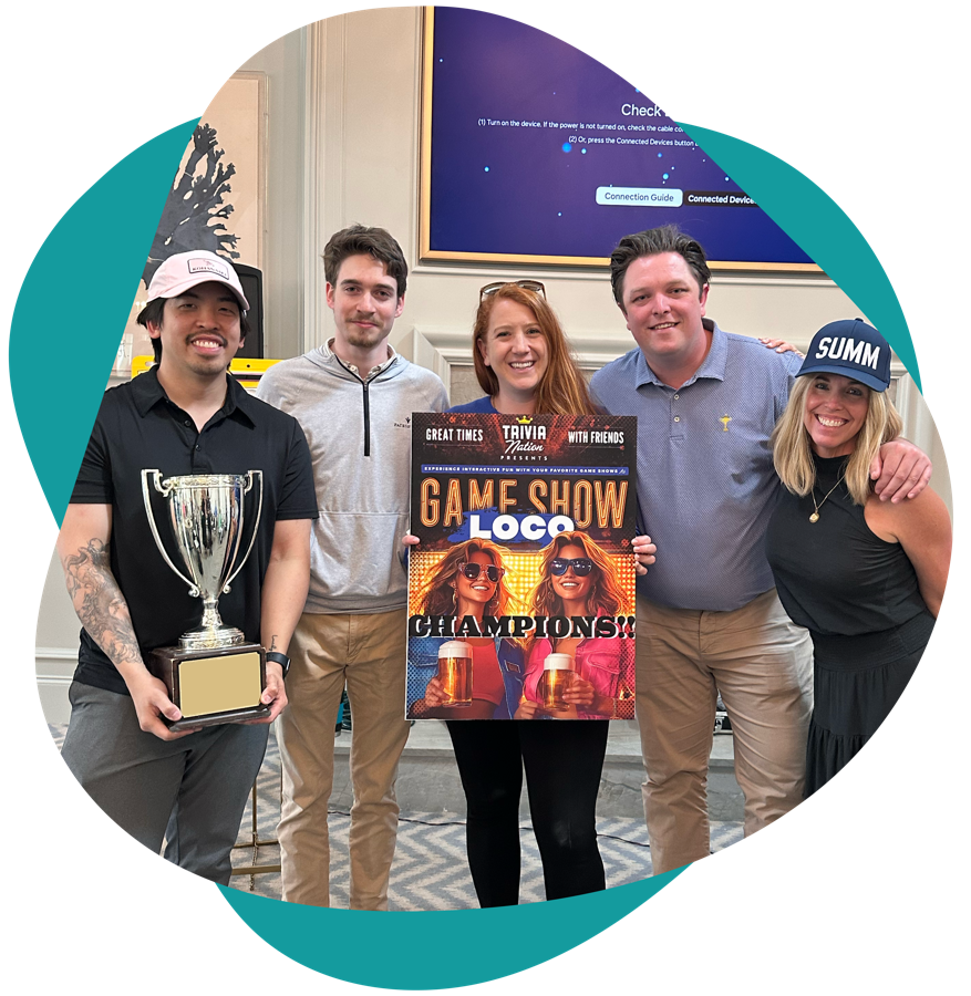 Game Show Loco champions celebrating with the trophy