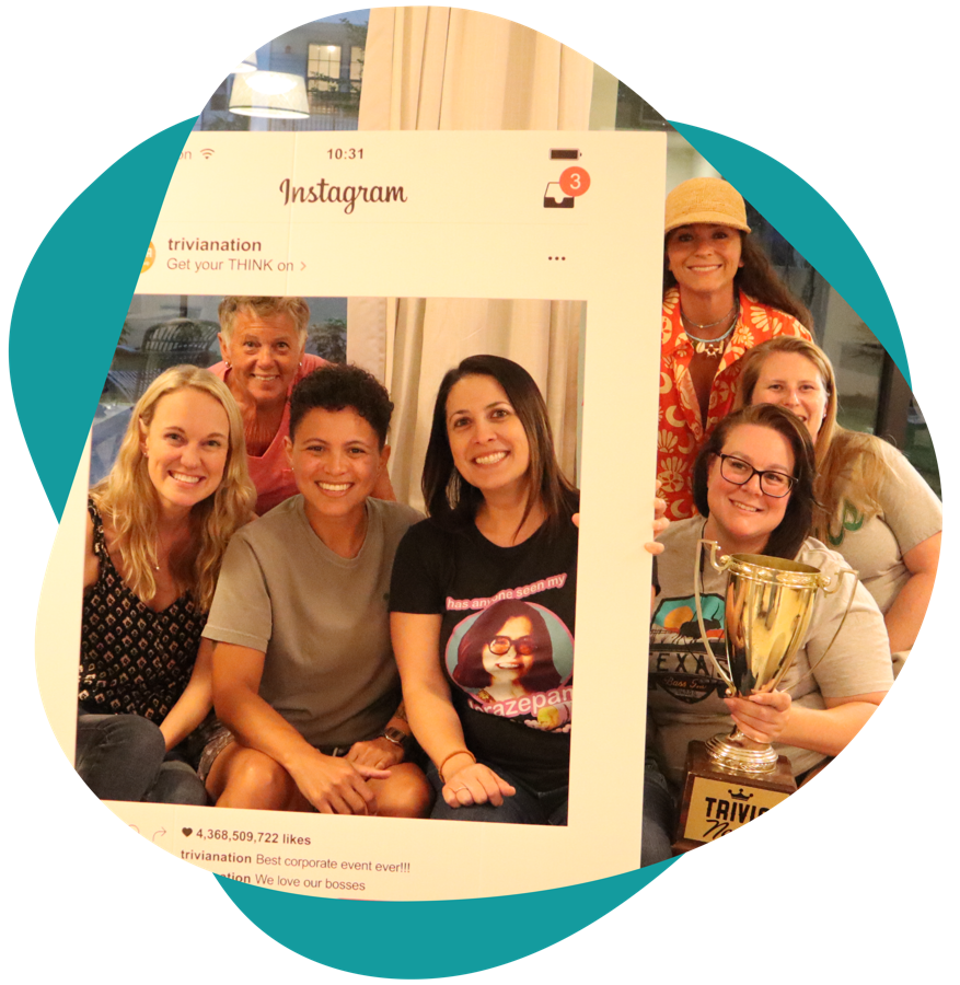 Guests posing inside the Trivia Nation Instagram photo frame
